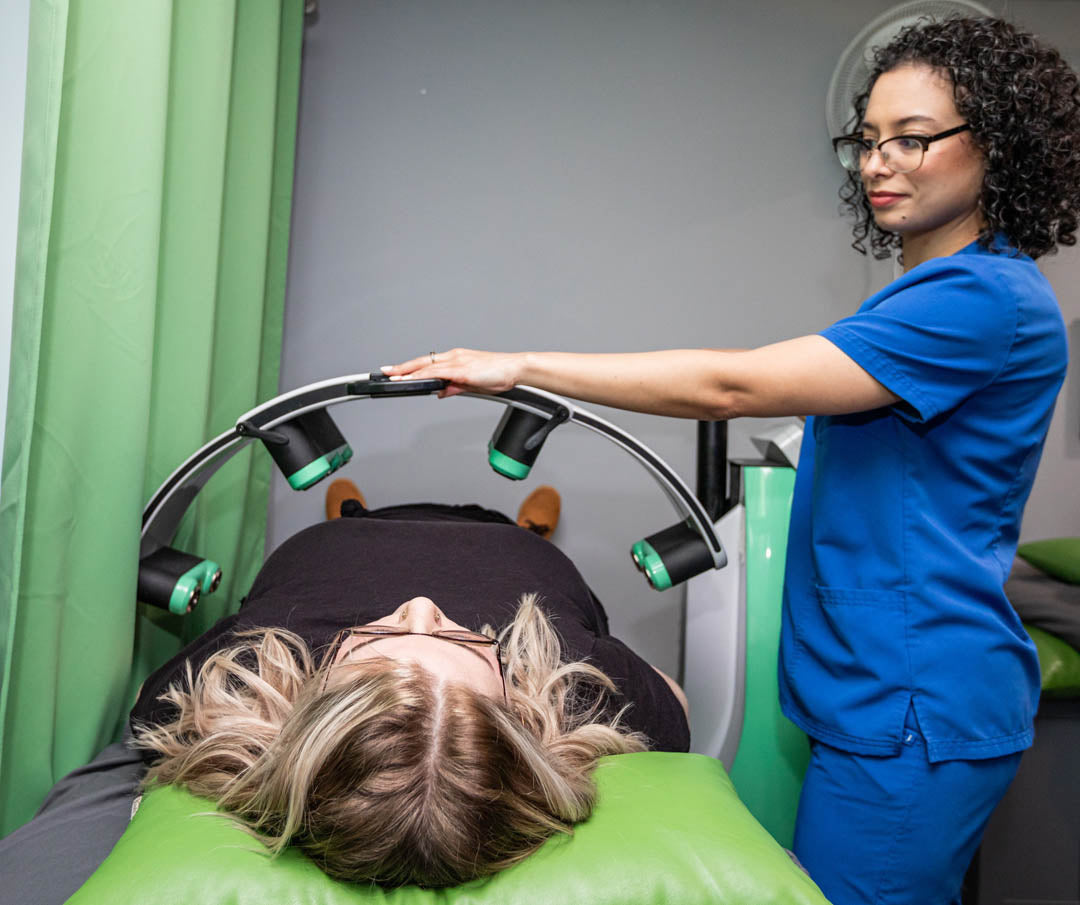Chinn GYN staff setting up Emerald Laser patient for her session