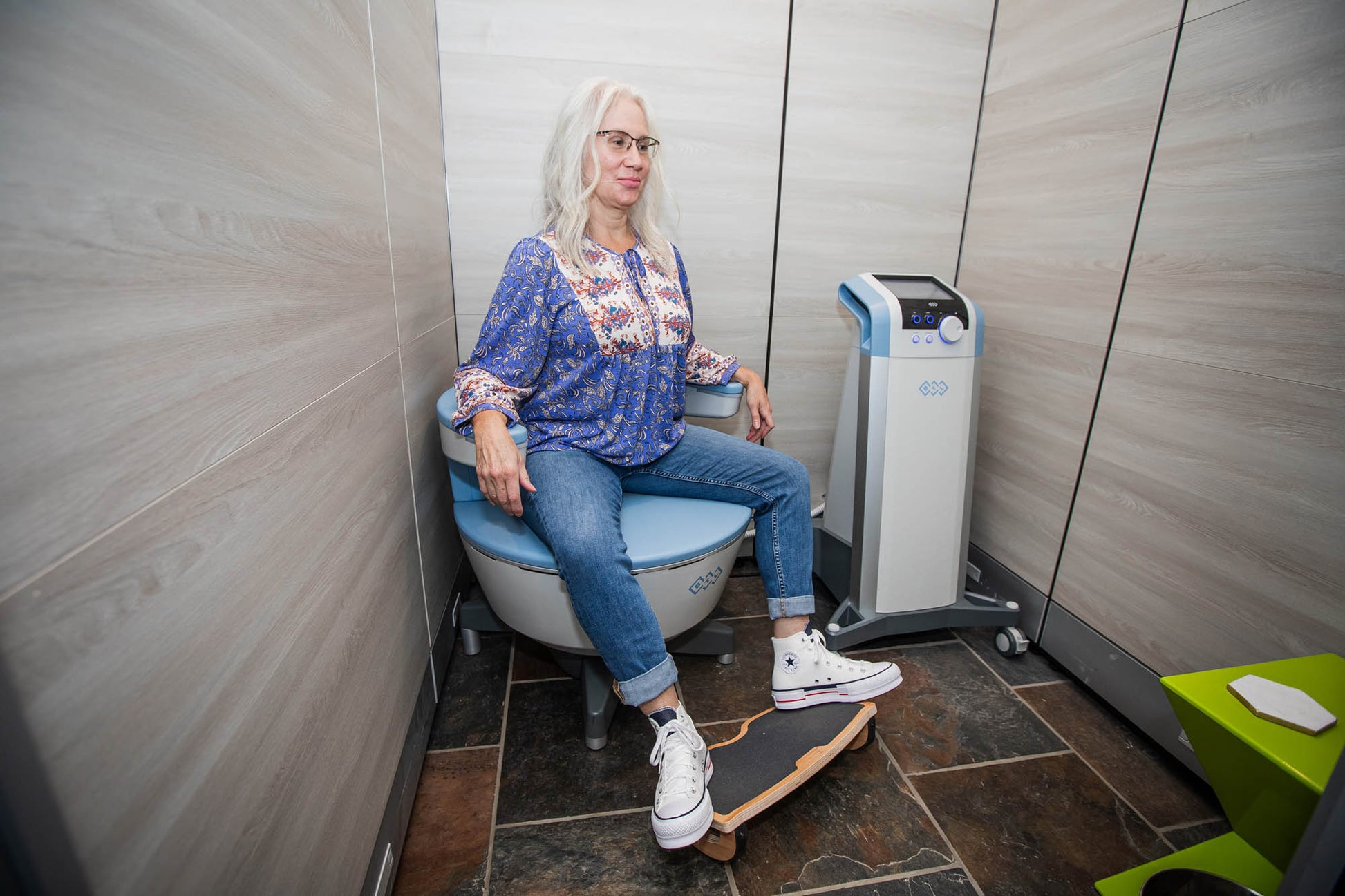Patient using the Emsella chair to correct bladder leakage.